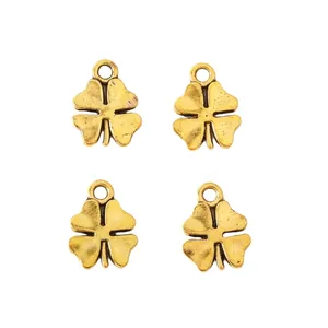 Set of four vintage zinc alloy four-leaf clover charms with antique bronze finish