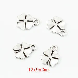 Detailed view of four-leaf clover charms in vintage silver finish measuring 12x9x2mm