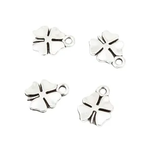 Set of four vintage silver clover pendants in zinc alloy for DIY jewelry making