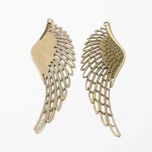 Pair of bronze-colored wing pendants with detailed feather textures for DIY jewelry making