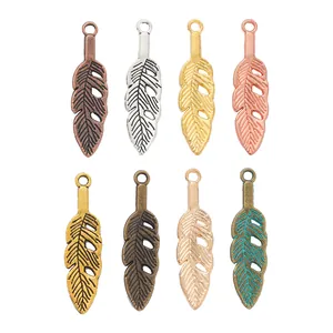 Vintage alloy feather pendants in eight assorted metallic finishes for DIY jewelry making