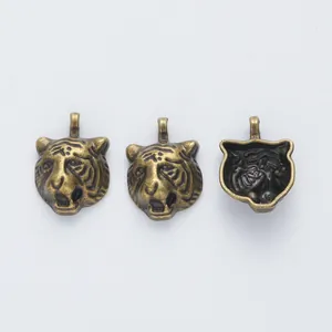 Vintage zinc alloy tiger head charms for DIY jewelry making in bronze finish