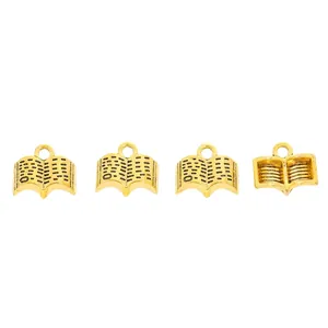 Set of four gold vintage book charms for DIY jewelry making with realistic page texture