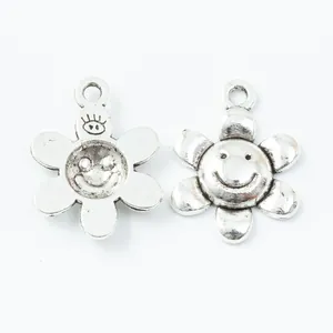 Ciondoli a girasole in argento vintage con faccina per creazione gioielli fai-da-te