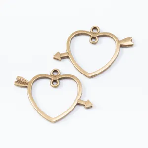 Vintage zinc alloy heart and arrow charms for DIY jewelry making with antique bronze finish