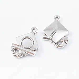 Silver alloy graduation cap charms with tassel and scroll detail for DIY jewelry making