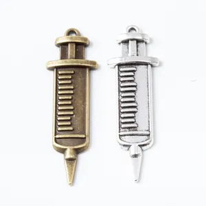 Vintage alloy syringe charms in bronze and silver finish for DIY jewelry crafting