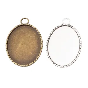 Vintage 30x40mm ovale Legierungs-Anhängerbasen in Bronze und Silber für Bastelarbeiten