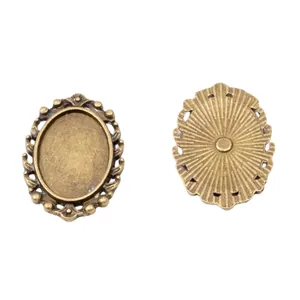 Antike Bronze 13x18mm ovale Legierungs-Anhänger für DIY-Schmuck mit Sonnenstrahl-Textur