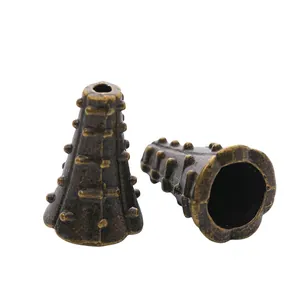 Zwei Vintage-Bronze-Blumenabstandshalter und hohle Perlenkappen für DIY-Schmuck