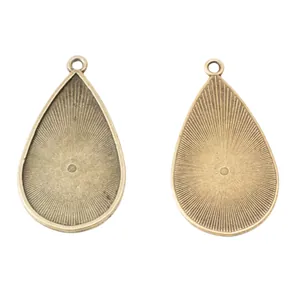Vintage Bronze Tropfen Anhängerbasis mit Sonnenstrahlmuster für DIY Schmuckherstellung