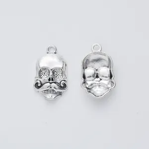 Vintage silver skull charms with mustache for DIY jewelry making, front and back view