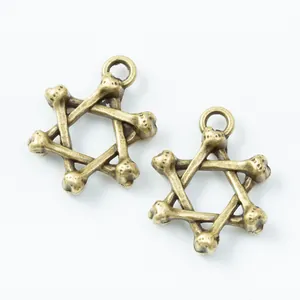 Set of two vintage bronze hexagram star pendants with bone-like texture for DIY jewelry
