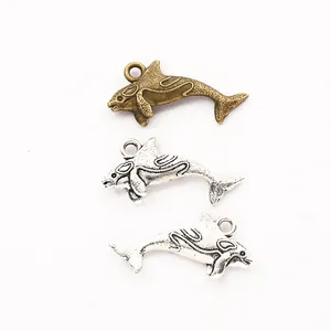 Vintage zinc alloy whale pendants in bronze and silver finishes for DIY jewelry making