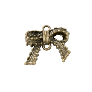 Conector de lazo de bronce antiguo con dos anillas para proyectos de joyería artesanal DIY
