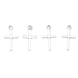 Set van vier vintage legering kruishangers in zilveren afwerking voor DIY sieraden
