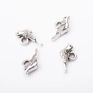 Set of four vintage antique silver bird charms for DIY jewelry and pendant accessories
