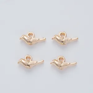 Set of four vintage gold alloy bird charms for DIY necklace and bracelet jewelry making