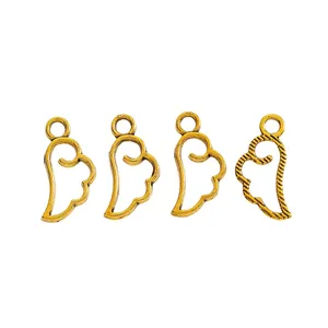 Set of four vintage alloy hollow wing heart charms for DIY jewelry making in antique gold