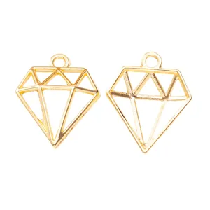 Pendentifs losanges évidés en alliage doré pour création de bijoux DIY sur fond blanc