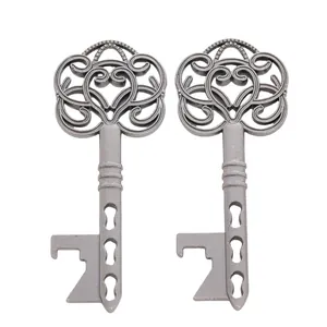 Detail of vintage silver heart-shaped key bottle openers made of zinc alloy