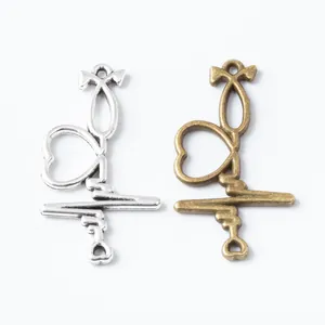 Vintage alloy stethoscope heart pendants in silver and bronze for DIY jewelry making