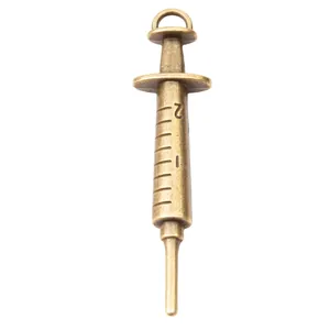 Vintage bronze medical syringe pendant for DIY jewelry making with realistic scale details
