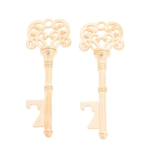Detailed close-up of golden vintage key bottle openers with heart cutout design