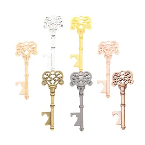 Vintage key-shaped bottle opener pendants in diverse metallic finishes on white background