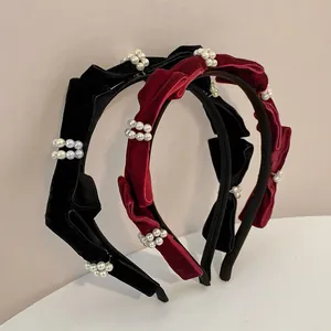 Elegant velvet headbands with pearls and vintage bow design in black and burgundy