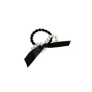 Élastique à cheveux noir élégant avec perles blanches et nœud pour un style vintage