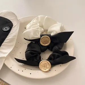 French vintage satin scrunchies with retro gold metal buckle and bow tie ribbons