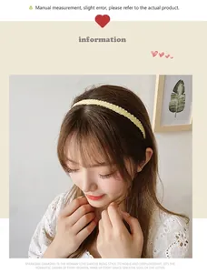 Detail of light yellow pleated fabric headband showing elegant wavy edge design on model