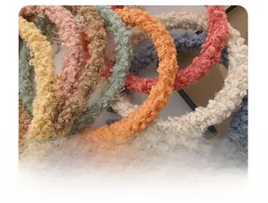 Close-up of soft colorful lambswool headbands in various pastel Morandi shades
