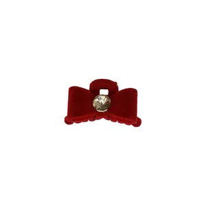 Elegant red velvet bow hair claw clip with a large sparkling rhinestone center decoration