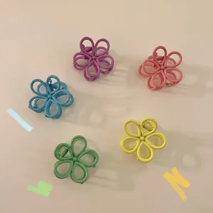5-piece set of colorful flower hair clips in macaron shades for women and girls