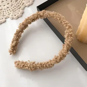 Cute khaki lamb wool headband with plush curly texture for a cozy forest aesthetic look