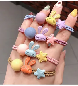 Détails d'élastiques lapin mignon avec corde élastique et accessoires étoiles dépolis