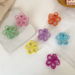 Colorful candy-colored flower hair claw clips for girls in a variety of vibrant pastel shades