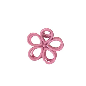 Pastel pink flower hair claw clip with matte finish and durable metal spring for women