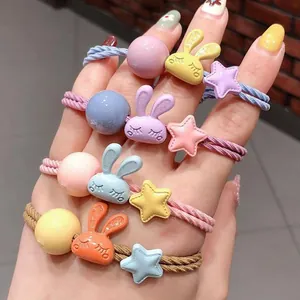 Lot de quatre élastiques à cheveux lapin dessin animé avec étoiles en résine et perles