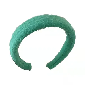 Mint green seersucker sponge headband with pleated texture and stylish wide design