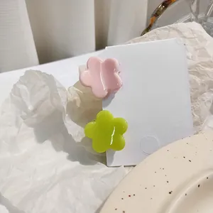 Cute cream floral mini hair clips set in pink and green colors for women