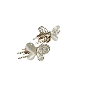 Exquisite silver butterfly hair clips set with shimmering rhinestones and cat eye stones
