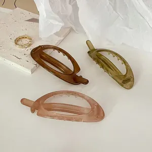 Minimalist acrylic hollow oval banana hair clips in amber, olive green, and pink colors