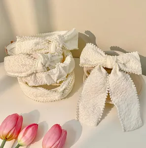 French vintage cream white pearl headband with textured fabric bow and floral accents