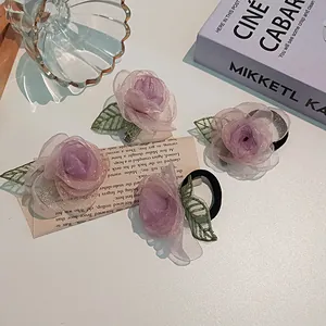 Ensemble de barrettes et chouchous camélia violets avec maille scintillante et feuilles