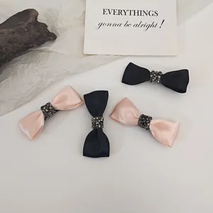 French vintage ribbon bow hair clip with rhinestones in black and dusty pink colors
