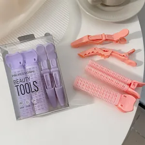 Detail of professional purple and pink hair root clips for natural volume and styling