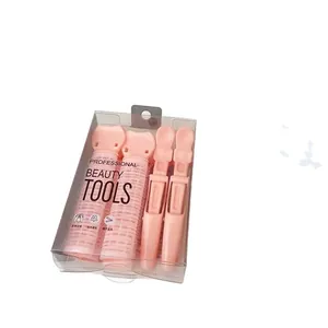 Pink hair root volumizing clip set with self-adhesive rollers for bouncy hair styling